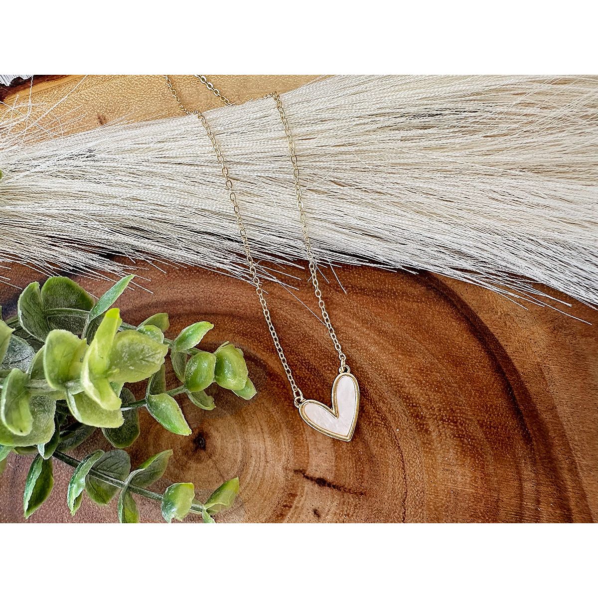 White Heart Necklace on a Golden Chain
