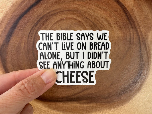 Man Cannot Live By Bread Alone, But Cheese... | Funny Christian Sticker