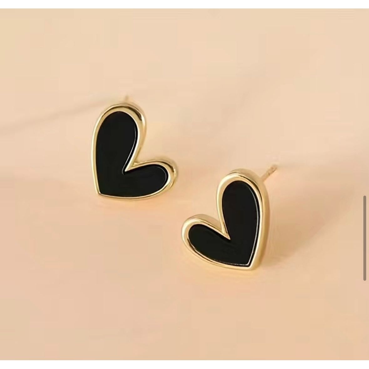 Gilded Black Heart Statement Stud Earrings